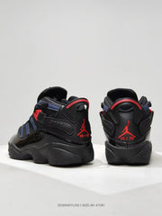 Rear view of black high-top sneakers with red Jordan branding and navy accents.
