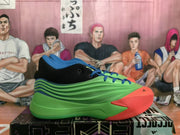 Side view showing the green layered upper, blue trim and red forefoot of an Adidas basketball sneaker.