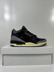 Side profile of the sneaker showing the lace area, layered overlays, cream midsole, and dark outsole.