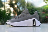 Nike Gray Low-Top Sneakers with White Sole