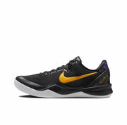 Black Kobe 8 sneaker with a gold Swoosh, purple heel accent and white outsole.