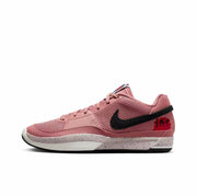 Dusty pink basketball sneaker with a black Swoosh and speckled light-colored midsole.
