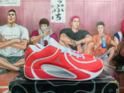 Side profile showing the red upper, side graphic, and molded midsole details