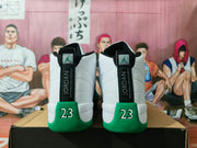 Rear view of the sneakers showing Jordan heel tabs and number 23 details