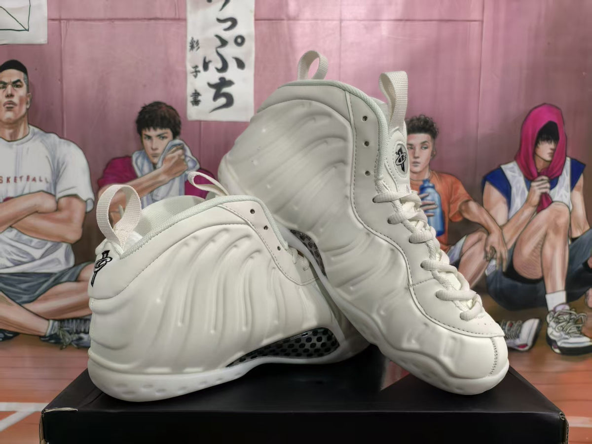 Pair of white high-top sneakers shown from the side and three-quarter front view on a black box.