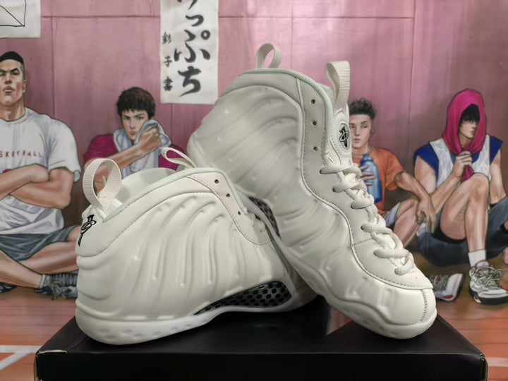 Pair of white high-top sneakers shown from the side and three-quarter front view on a black box.
