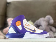 Side profile showing the high-top collar, perforated orange panel, layered overlays, and white outsole.