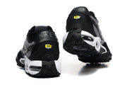 Rear view of the black and grey sneakers showing heel details and outsole.