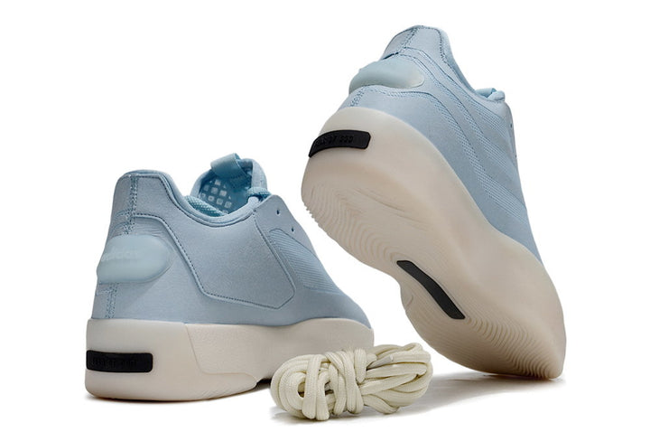 Light blue Adidas FOG 2.0 sneakers shown from the rear and outsole view with an additional lace set.