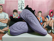 Angled side view showing the sculpted purple uppers and green heel details