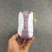 Rear view showing the pink heel panel, Jordan branding strip and raised 23 detail.