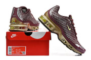 Nike Air Max Plus VII sneakers beside a red shoe box; the label shows a sample size.