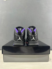 Rear view of the pair showing white Jordan branding on the black heel panels.