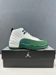 Clean side profile of one white and green high-top sneaker displayed on a black Jordan shoebox.