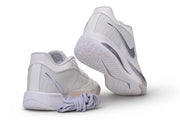 White Nike Sabrina 4 basketball shoes shown from the heel and outsole