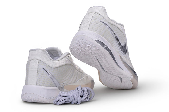 White Nike Sabrina 4 basketball shoes shown from the heel and outsole