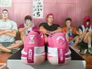 Rear view of pink Nike basketball sneakers with white and pink heel details
