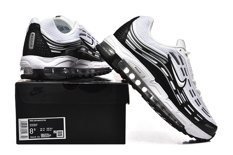 Black and white Nike Air Max 97 sneakers displayed with a shoebox showing a size label.
