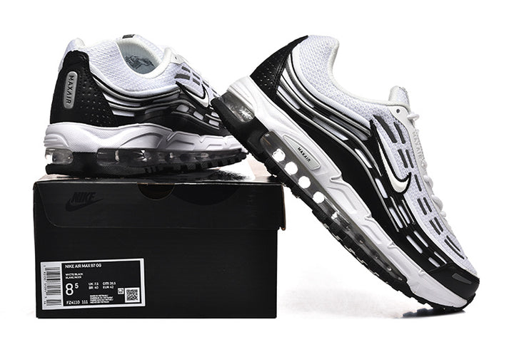Black and white Nike Air Max 97 sneakers displayed with a shoebox showing a size label.