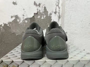Rear view of dark gray Nike Kobe 5 FTB basketball shoes showing signature heel details.