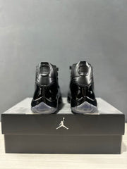 Rear view of the pair showing black heel panels, pull tabs, and translucent gray heel sections.