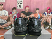 Rear view showing the speckled heel panels on black basketball shoes