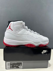 Single sneaker beside its box, with the box label showing Air Jordan 11 Retro, CT8012-160, and EU 43.