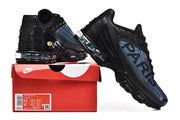 Black and blue Nike Air Max Plus III Paris sneakers displayed with a red shoebox; the box label shows Air Max Plus III.