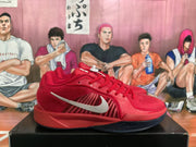 Side profile of a red Nike basketball sneaker with a contrasting white Swoosh and dark outsole.
