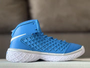 Side profile of a blue high-top sneaker showing the lace-up upper and textured sole.