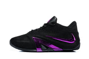 Side view of a black shoe with a purple side logo and geometric accent