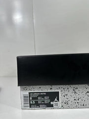 Air Jordan 4 Retro box label showing Gray/White/Black, style code AQ9129-005, and photographed sample sizing.