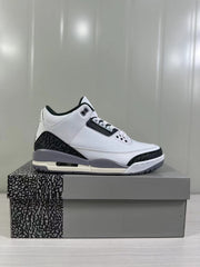 Side profile showing the white upper, black elephant-print overlays, grey midsole, and visible outsole window.
