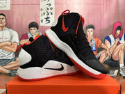 Pair of black, white, and red high-top Nike basketball shoes shown at an angle.