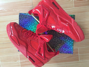 Side and outsole view of red high-top sneakers showing the molded midsole and heel air window.