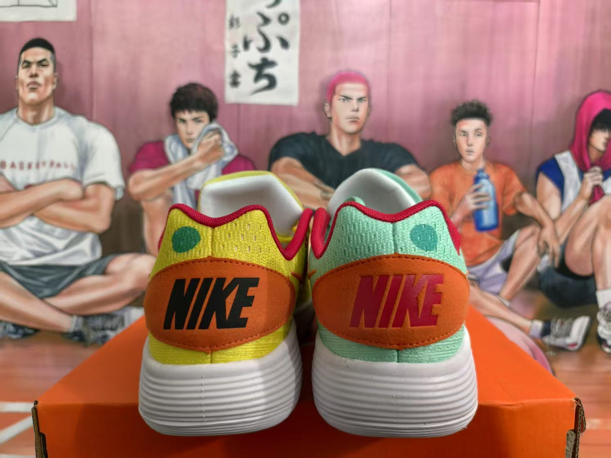 Rear view of mismatched mint green and yellow Nike sneakers with orange heel panels, red lining, and white textured soles.