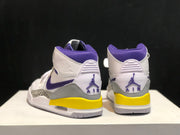 Rear view of the pair showing purple collars, white heel panels, grey overlays, yellow midsole sections, and AIR branding.