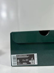 Dark green shoebox with a visible label identifying Air Jordan 4 Retro, color description, size details, and style code FQ8138 103.