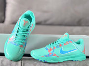 Top and side views of the turquoise Kobe 5 Protro shoes with perforated toe panels.