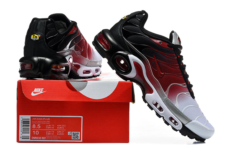 Nike Air Max Plus sneakers in white, red, and black displayed with a box labeled Air Max Plus and DM0032 022.