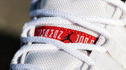 Close-up of the red tongue label with Jordan branding.