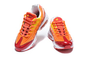 Front view of the orange and red Nike Air Max 95 TT pair