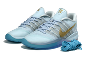 Pair of icy blue Nike Sabrina 3 shoes with gold accents