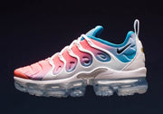 Side profile of the pink-and-blue Nike Air VaporMax Plus sneaker