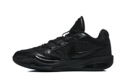 Side profile of a black Nike 518-6 sneaker showing the Swoosh, textured upper, and padded collar.