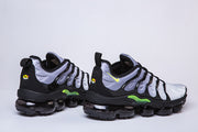 Pair of Nike TN-9 sneakers shown from the rear and side.