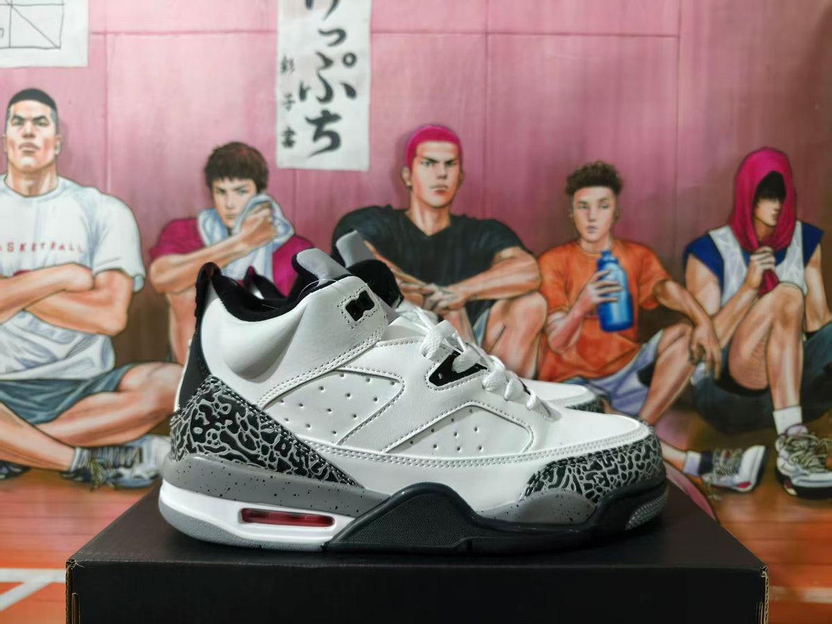 Side view of a white and grey Jordan 4-style sneaker with black elephant-print overlays.