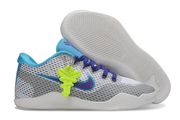 Gray and blue Kobe 11 shoe beside its textured light-colored sole