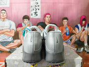 Rear view showing gray heel panels and small Swoosh details.