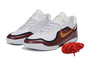 Pair of white, black and red Nike LeBron 23 basketball shoes shown from the front with red laces.